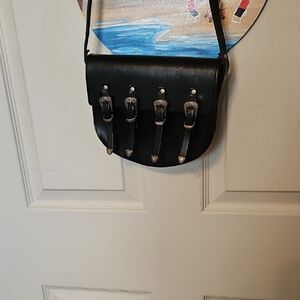 Elegant Black Crossbody Bag with Buckle Accents